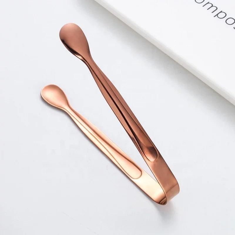 https://hsaperfumes.com/cdn/shop/files/charcoal-cube-tongs-mini-metal-serving-tongs-clip-tea-party-stainless-steel-ice-tongs-accessories-hsa-perfumes-5-32037471289582.jpg?v=1694760170